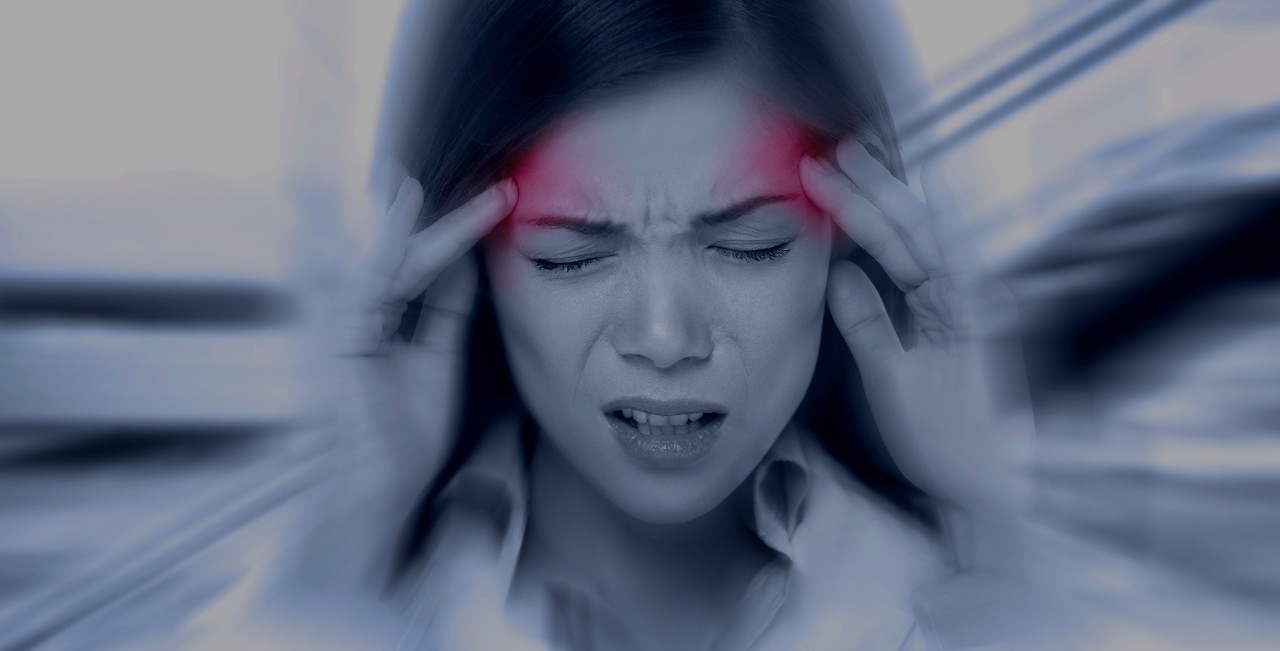 Headache migraine people - Doctor woman stressed. Woman Nurse / doctor with migraine headache overworked and stressed. Health care professional in lab coat wearing stethoscope at hospital.